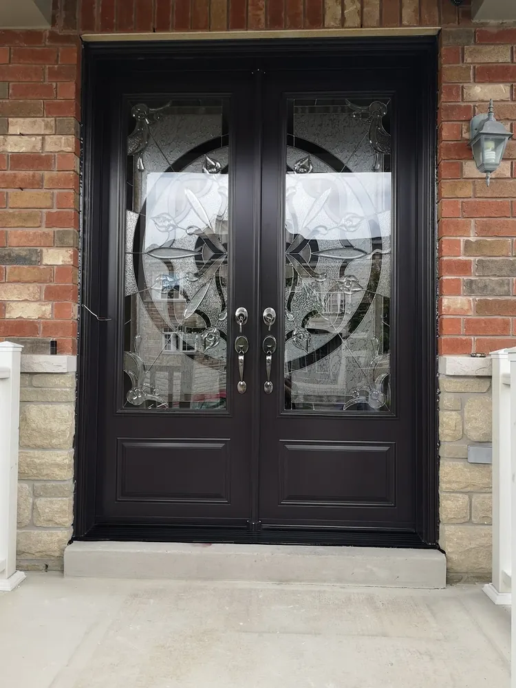 Black double doors with wrought-iron glass in Hamilton, installed by Panorama Windows & Doors Black double doors with wrought-iron glass in Hamilton