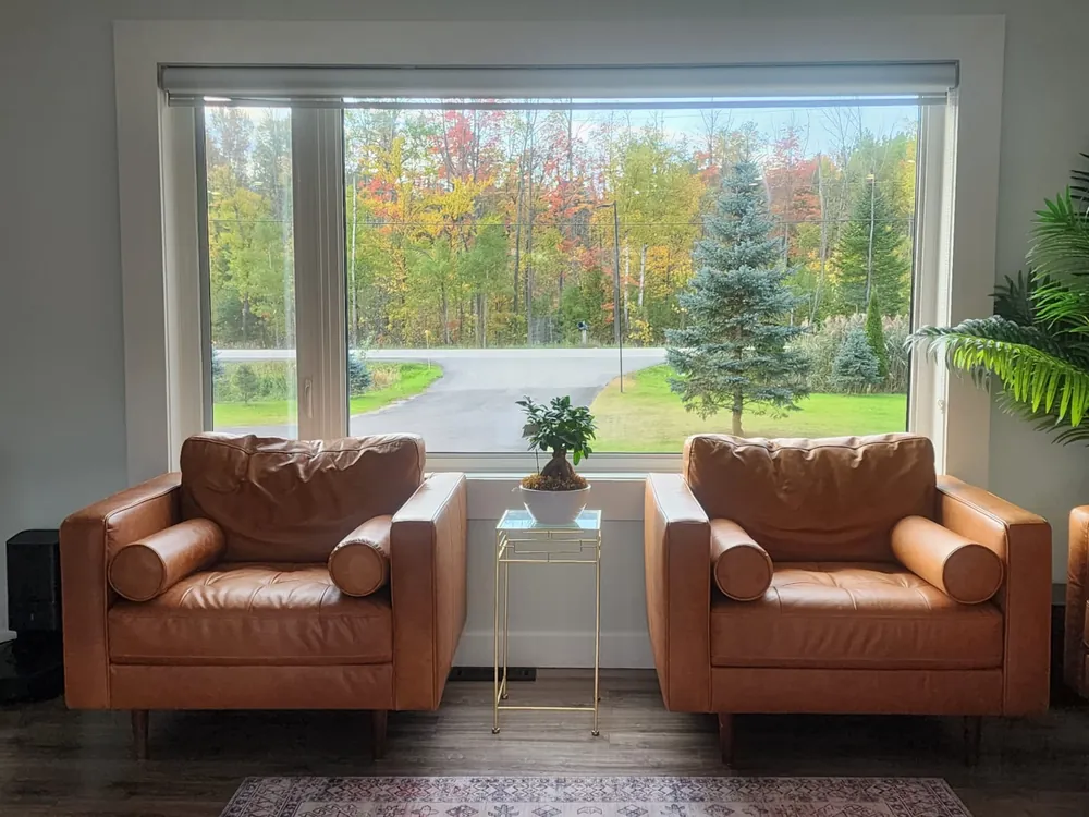 Large picture window in a bright living room, installed by Panorama Windows & Doors Large picture window in a bright living room