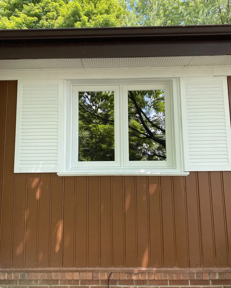 Window Between Shutters Replaced: after Window between white shutters after replacement