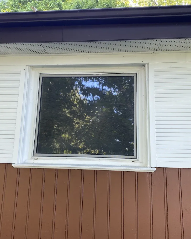 Window Between Shutters Replaced: before Window between white shutters before replacement